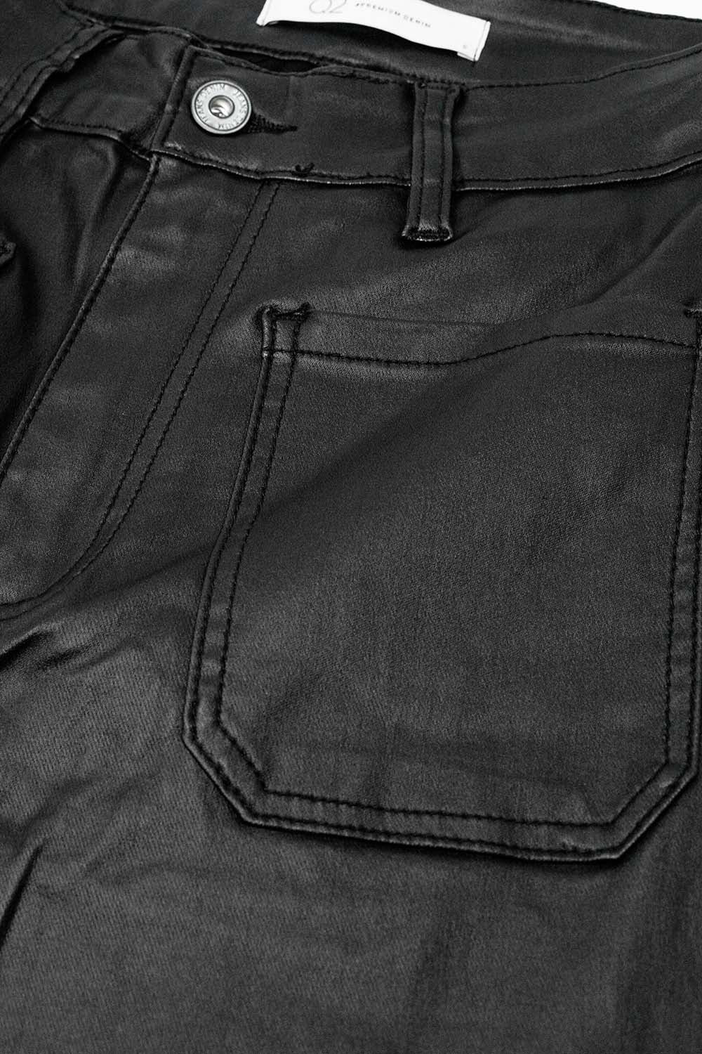 Pantalon en simili-cuir avec jambe large et poches