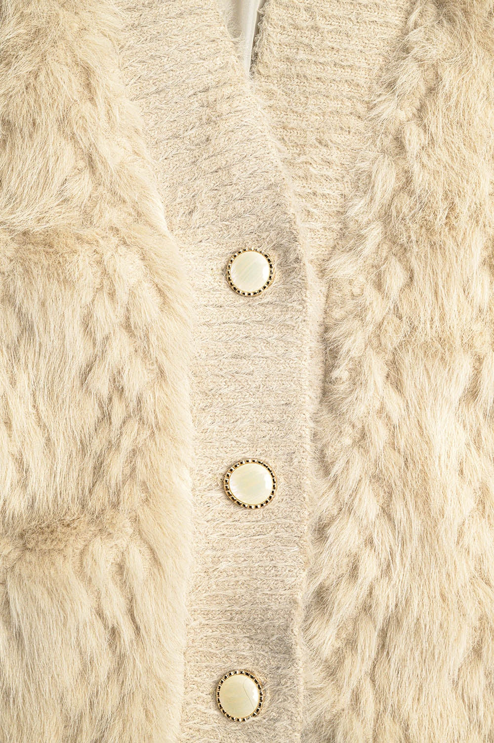 Veste courte en fourrure fine beige