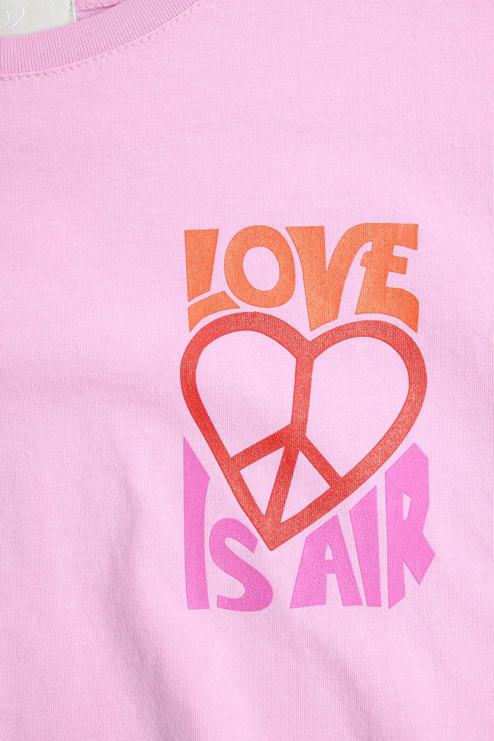 T-Shirt rose avec le logo Love is Air et Heart with Peace