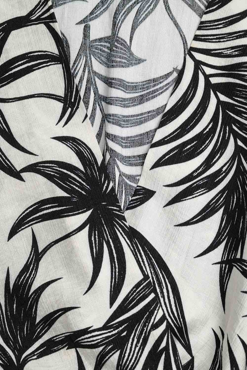 Haut court en blanc avec motif tropical en noir