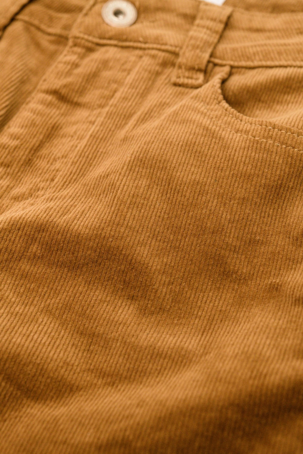 Pantalon évasé en velours côtelé marron avec imprimé léopard sur le bas