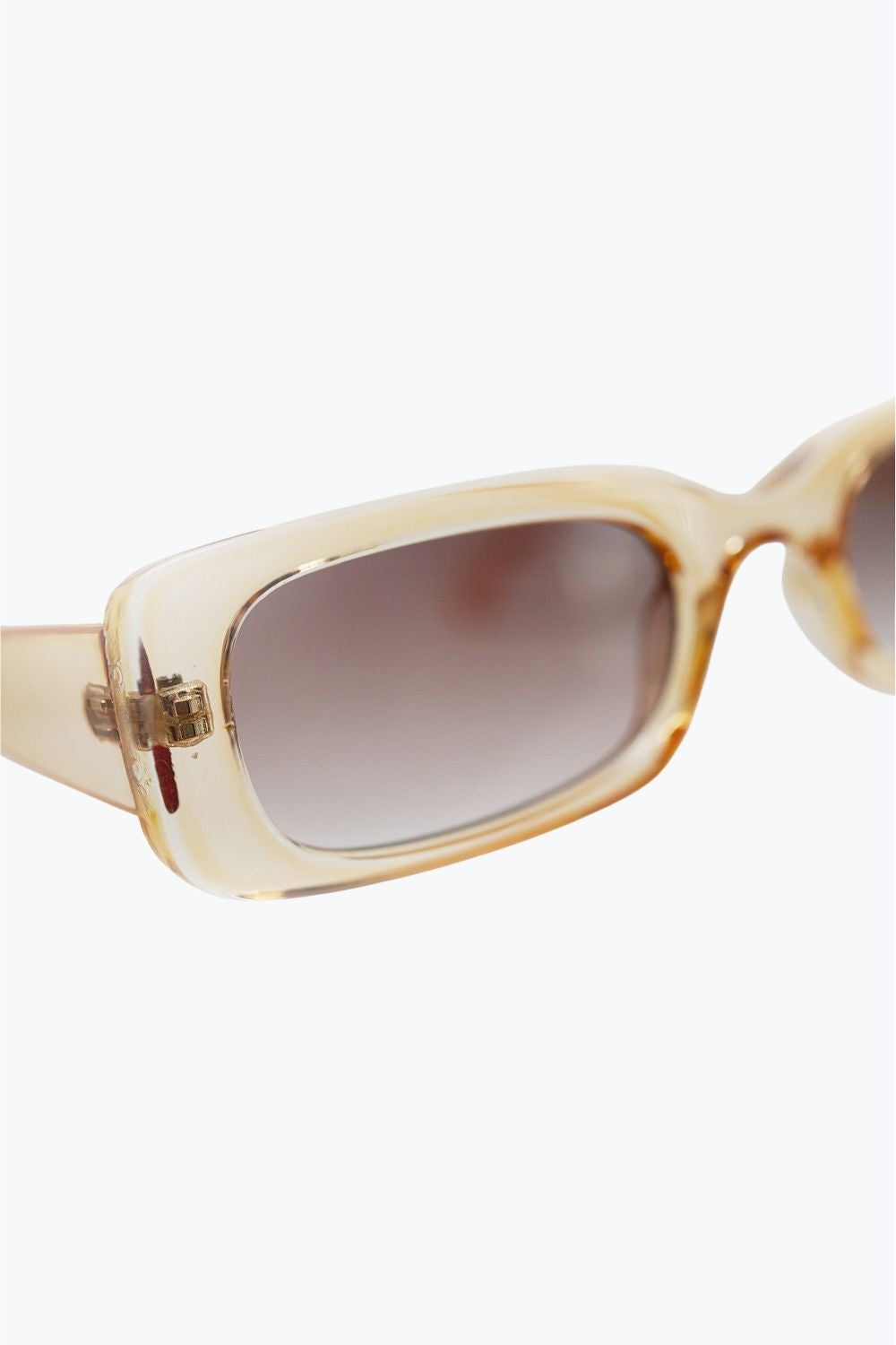 Lunettes de soleil rectangulaires jaunes transparentes avec verres fumés bruns