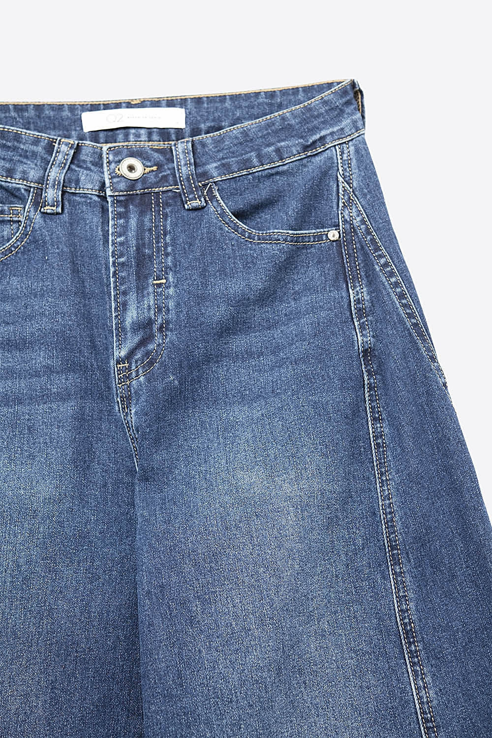 Jean classique à jambes larges en denim bleu avec couture
