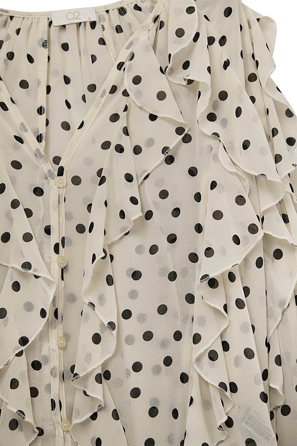 Chemise en mousseline de soie boutonnée à pois avec volants