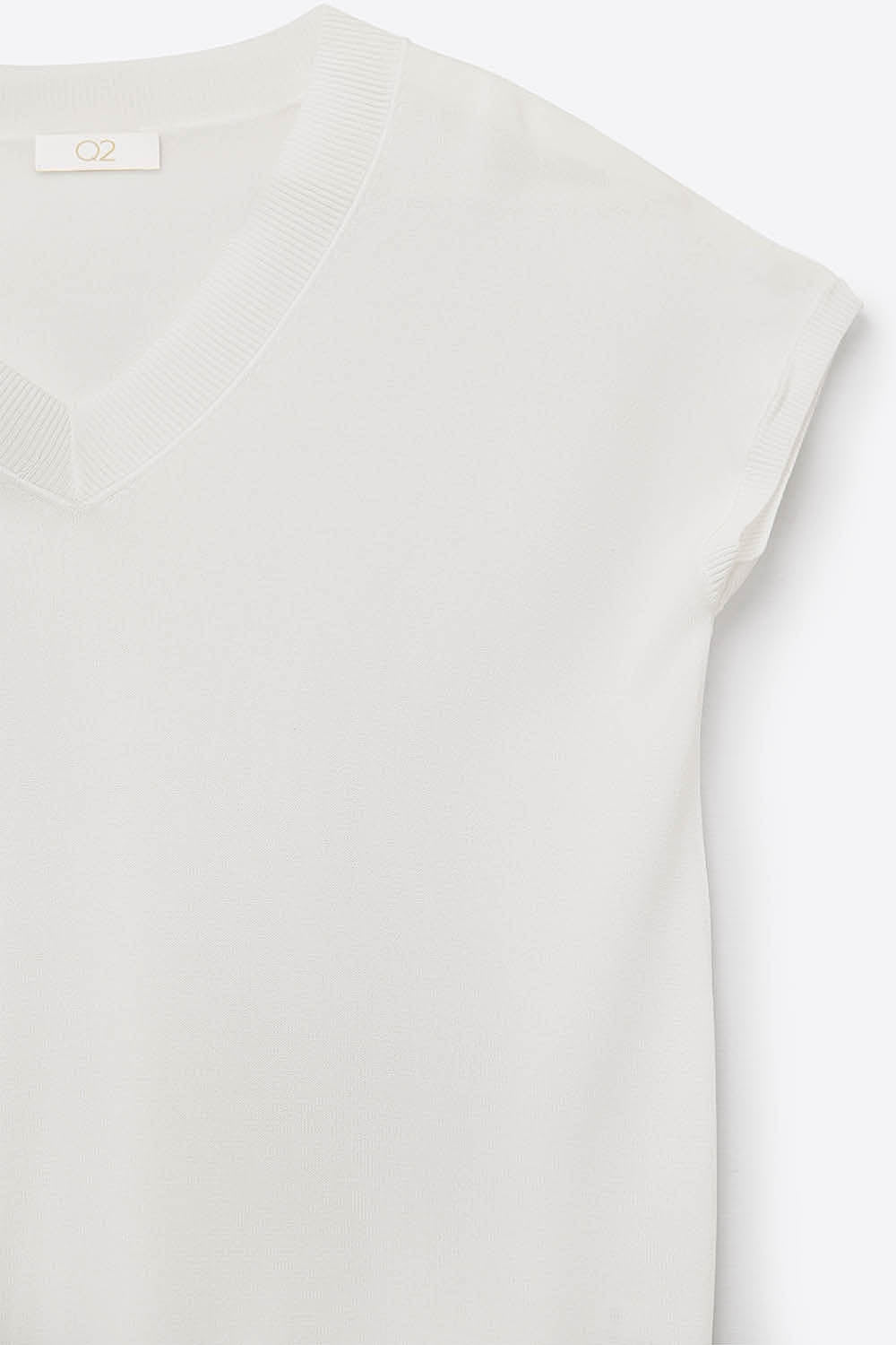 Pull blanc à col en V en maille légère et à manches courtes