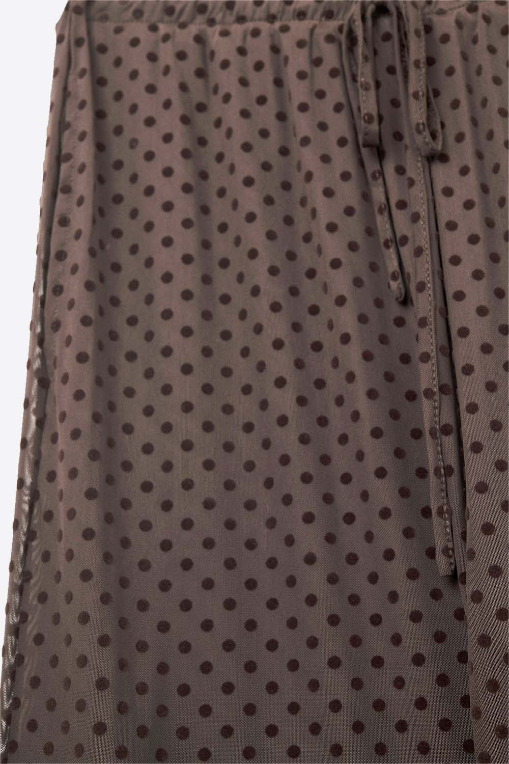 Pantalon chic à pois transparents marron avec poches latérales