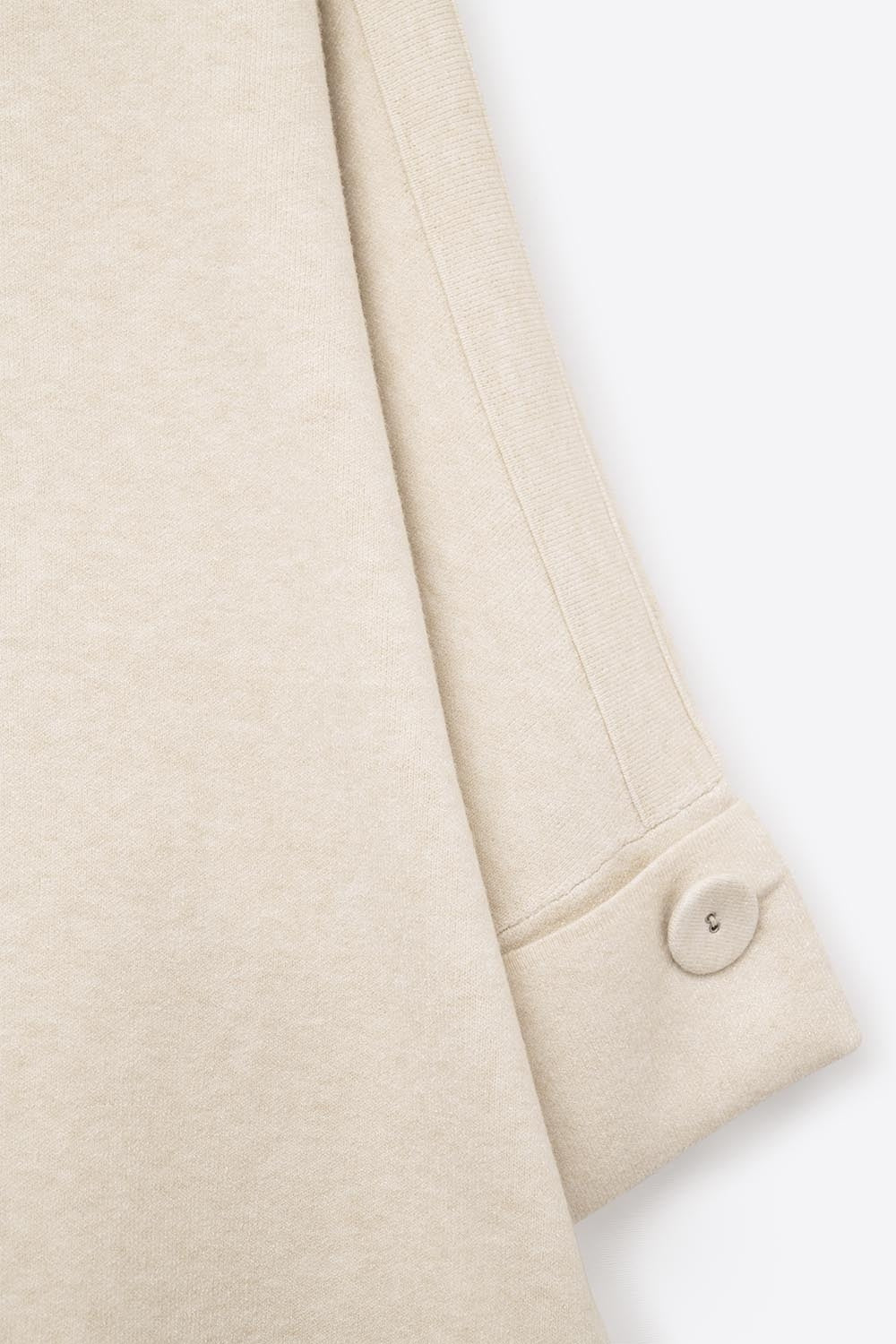 Pull en maille crème avec détails de boutons