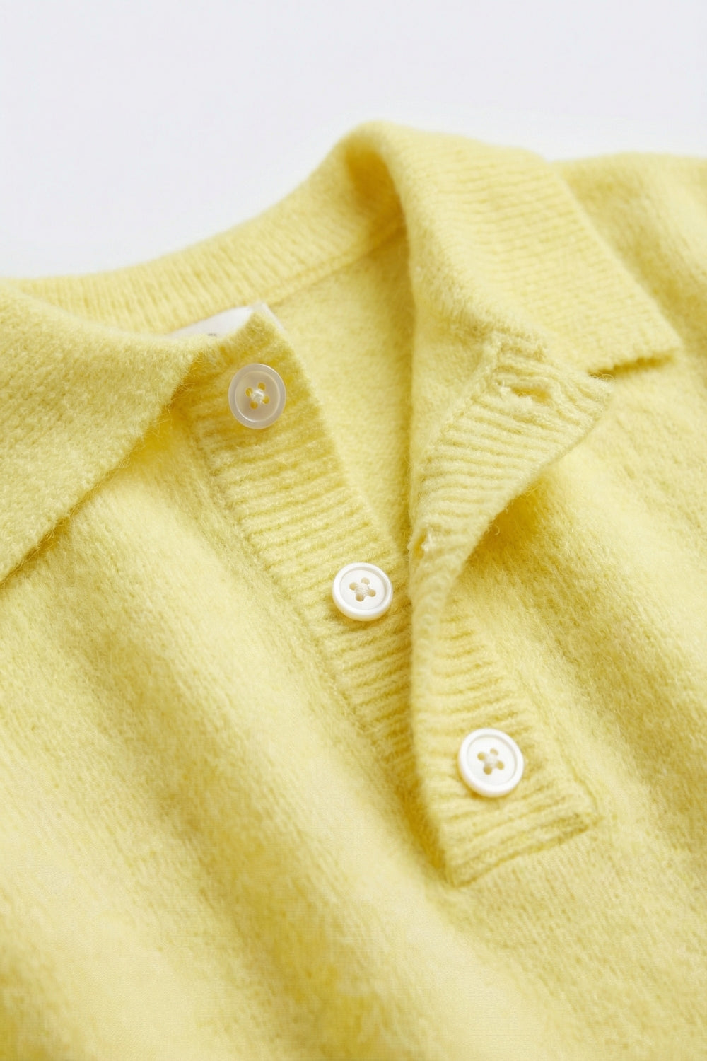 Polo jaune en tricot à manches courtes