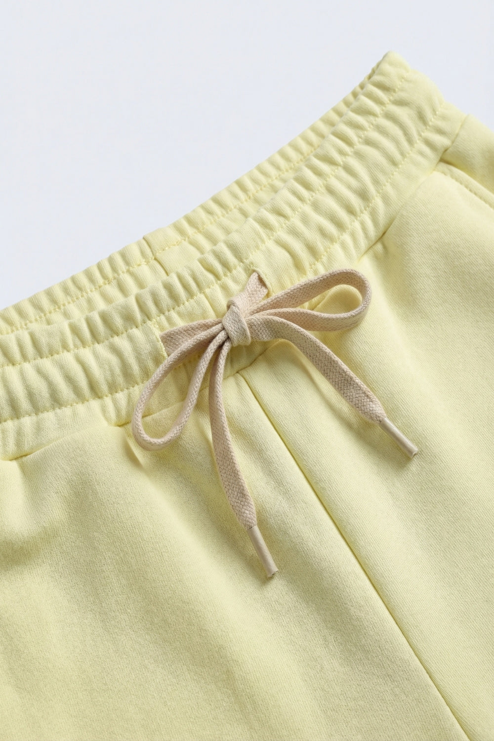 Pantalon de survêtement à coupe droite en tricot jaune avec taille élastique et cravate