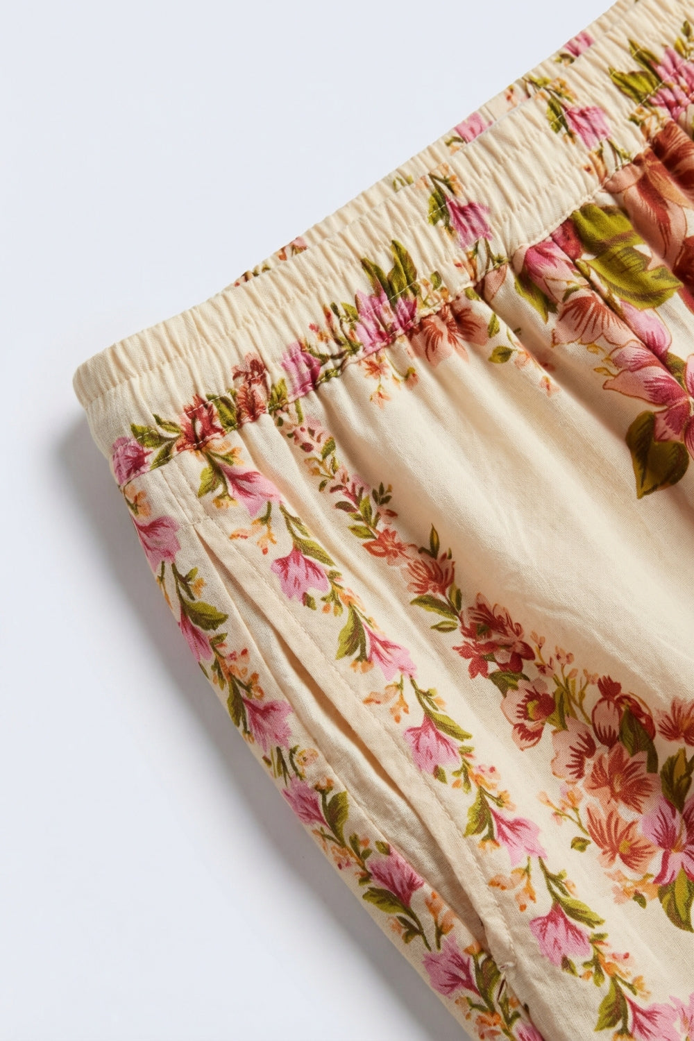 Pantalon large imprimé floral en beige