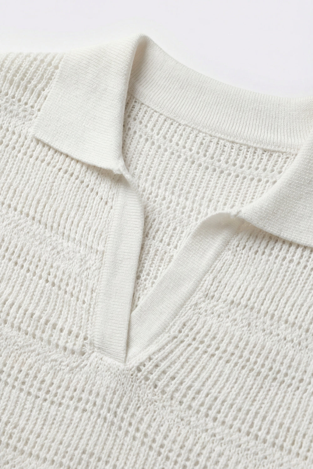 Polo blanc à manches courtes et maille ouverte