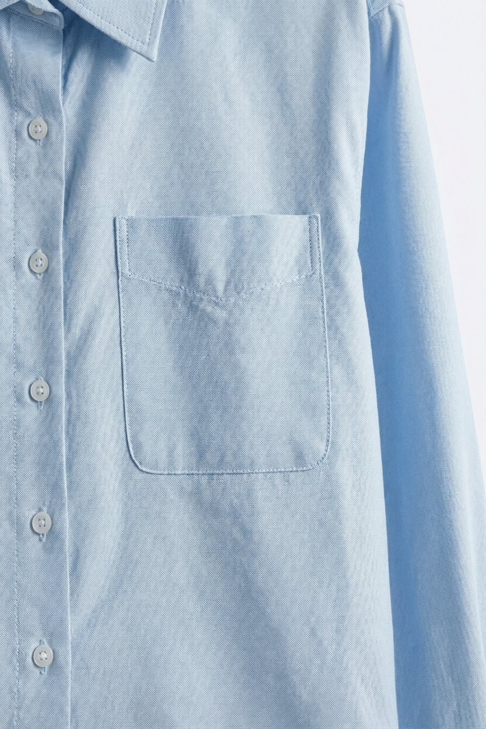 Chemise courte à boutons-pression bleu clair en tissu de coton
