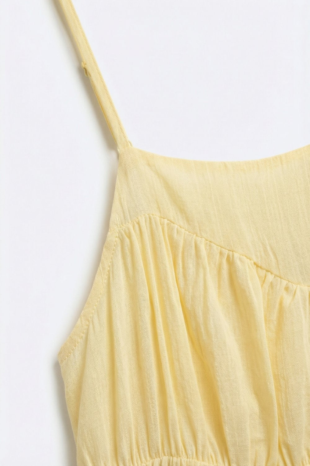 Top asymétrique à bretelles spaghetti superposé léger jaune beurre