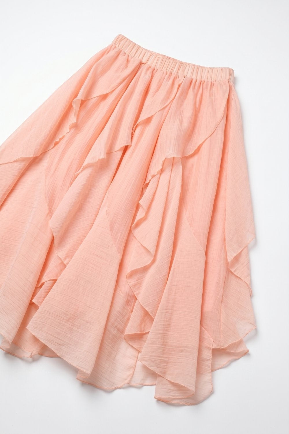 Jupe midi asymétrique à volants en tissu léger rose