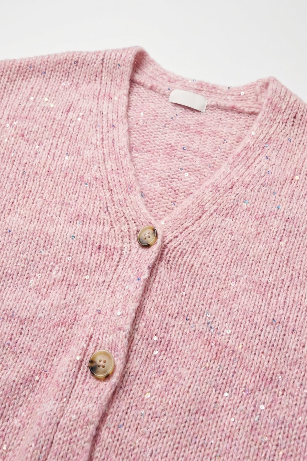 Cardigan ample en tricot boutonné rose moelleux avec détails en sequins