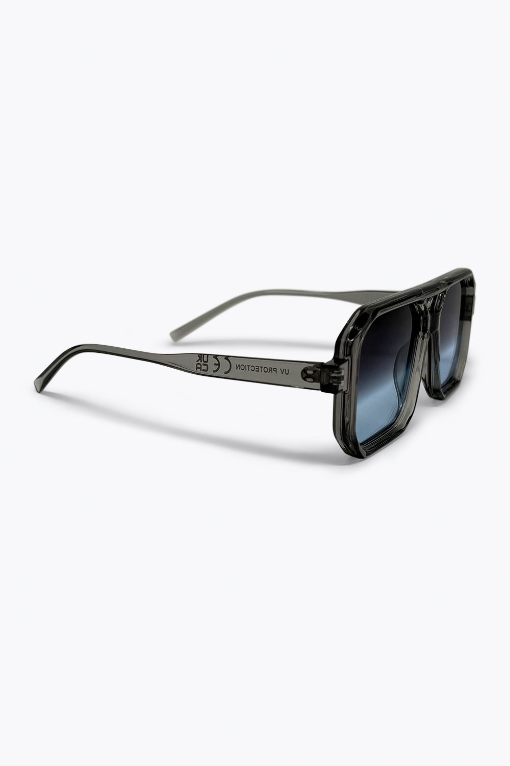 Lunettes de soleil géométriques oversize à dégradé avec monture transparente grise
