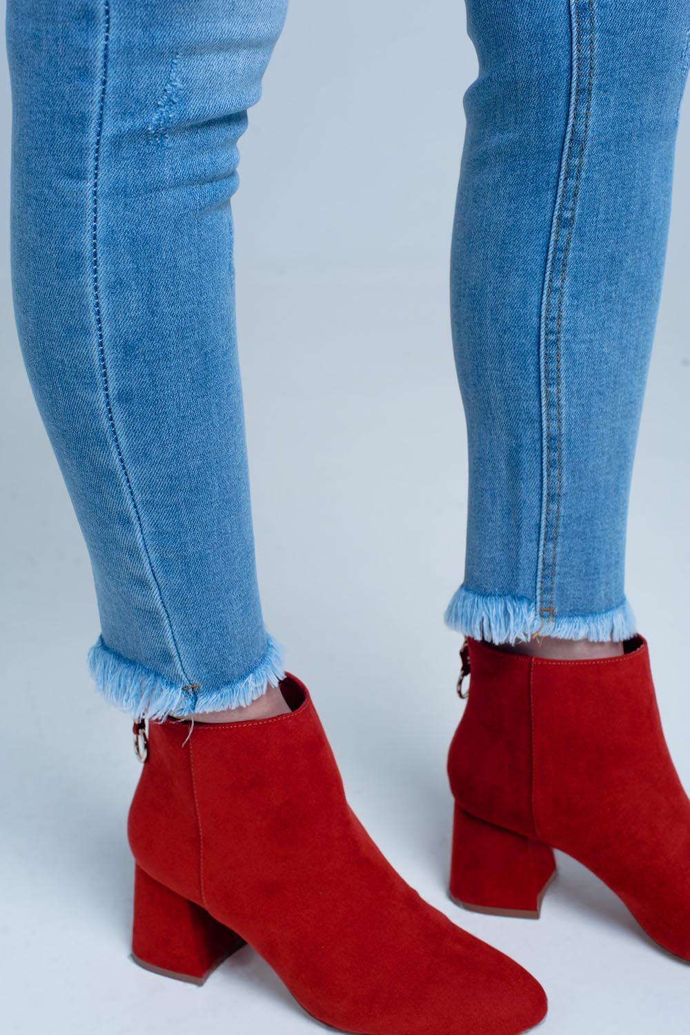 jeans skinny à franges à la basse