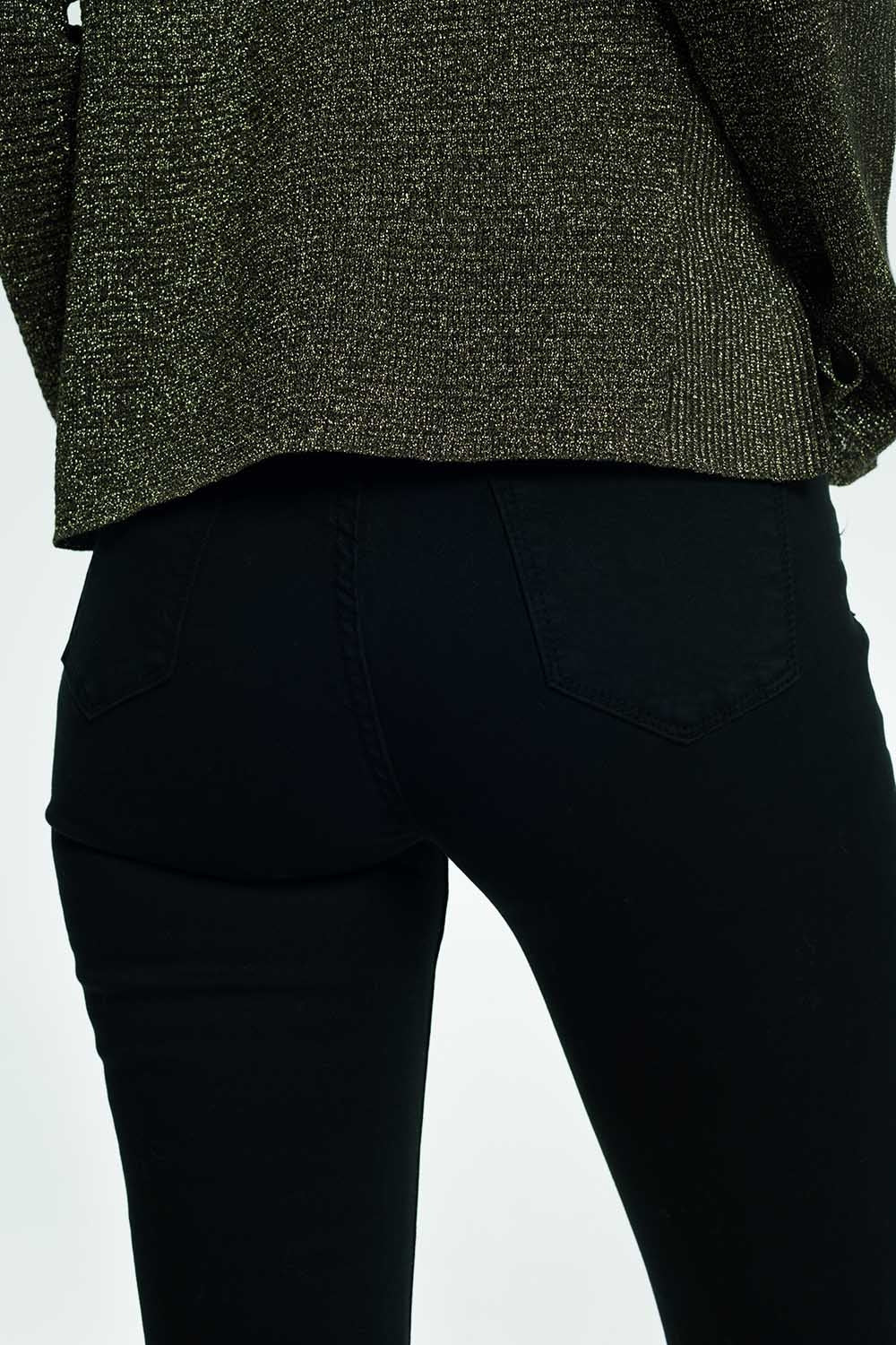 Jean taille haute évasé à ourlet brut en noir