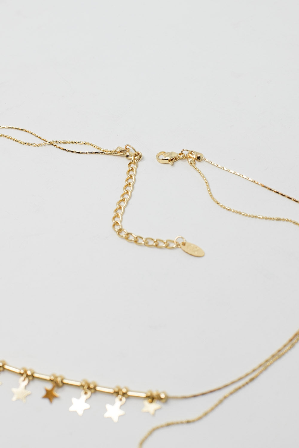 Collier 2 en 1 avec breloques étoile et coeur