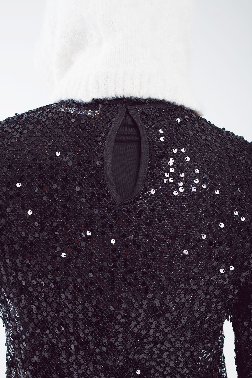 Top à paillettes à manches longues en noir