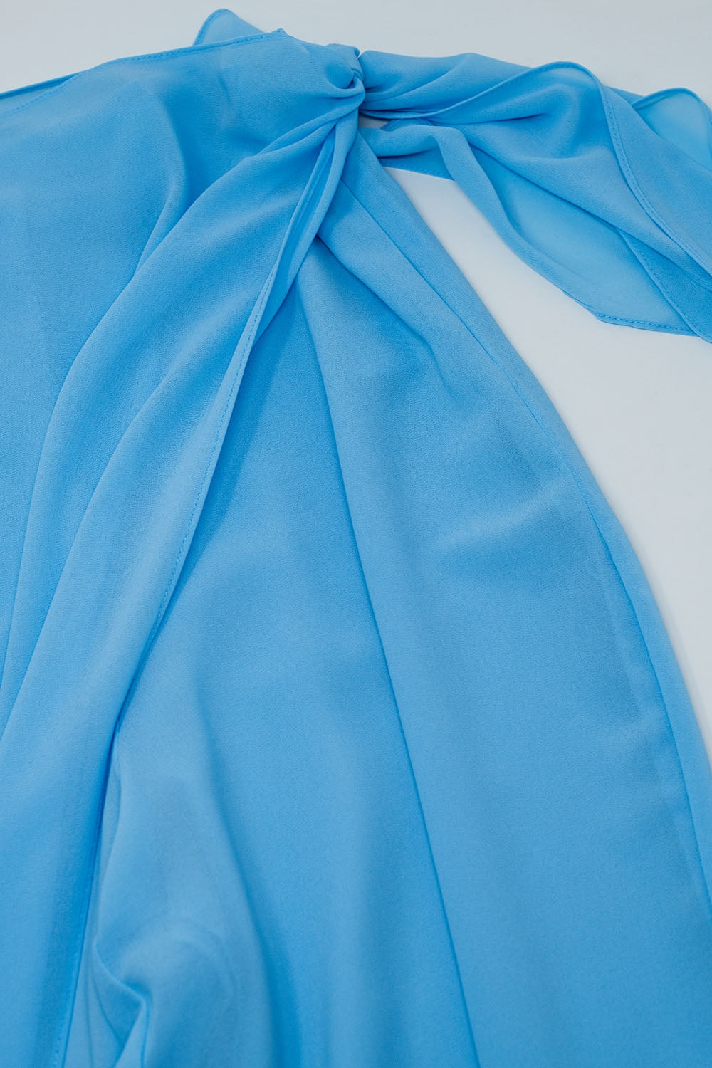 Pantalon large bleu clair Jupe superposée nouée sur le côté