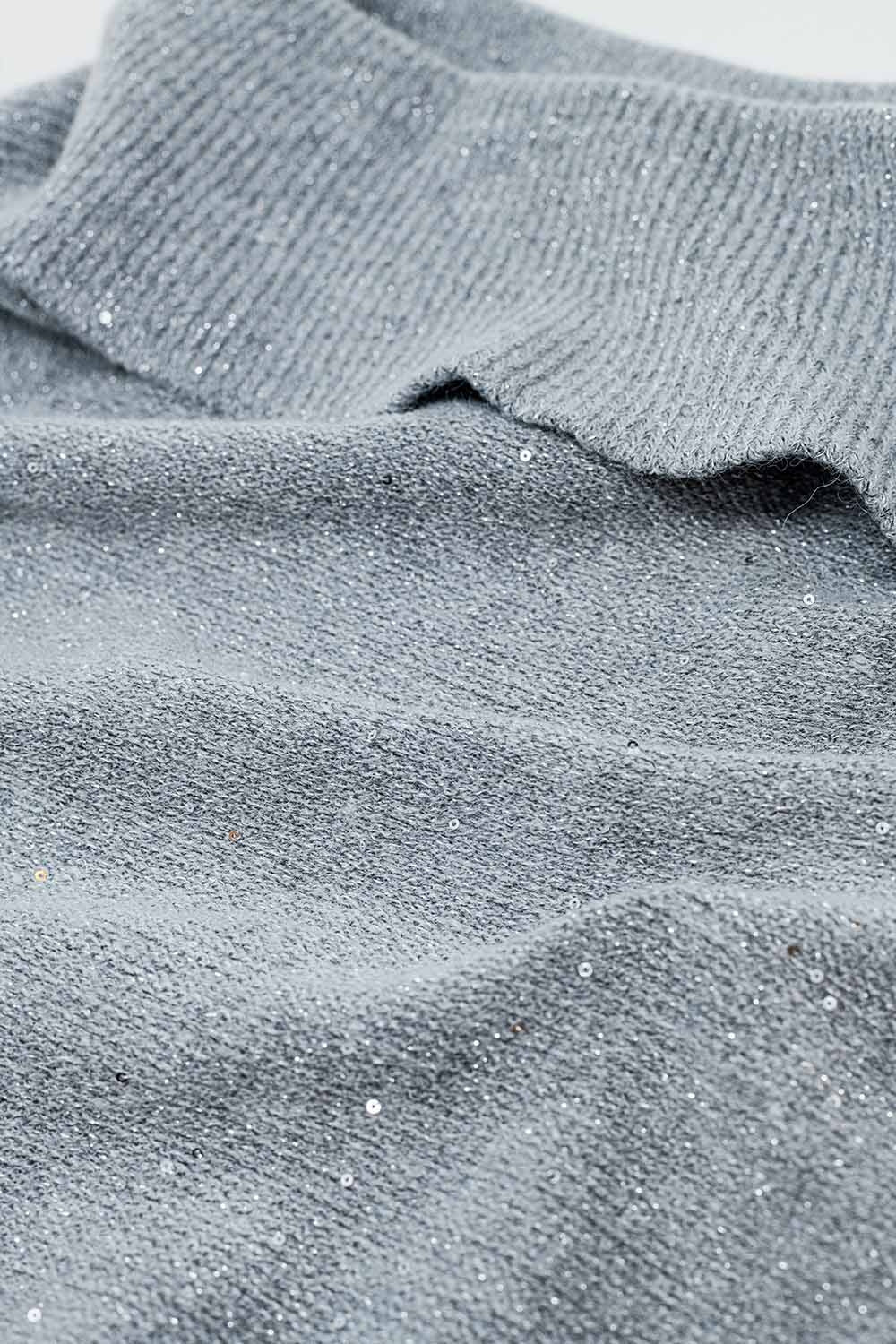 Pull gris à col bateau et paillettes