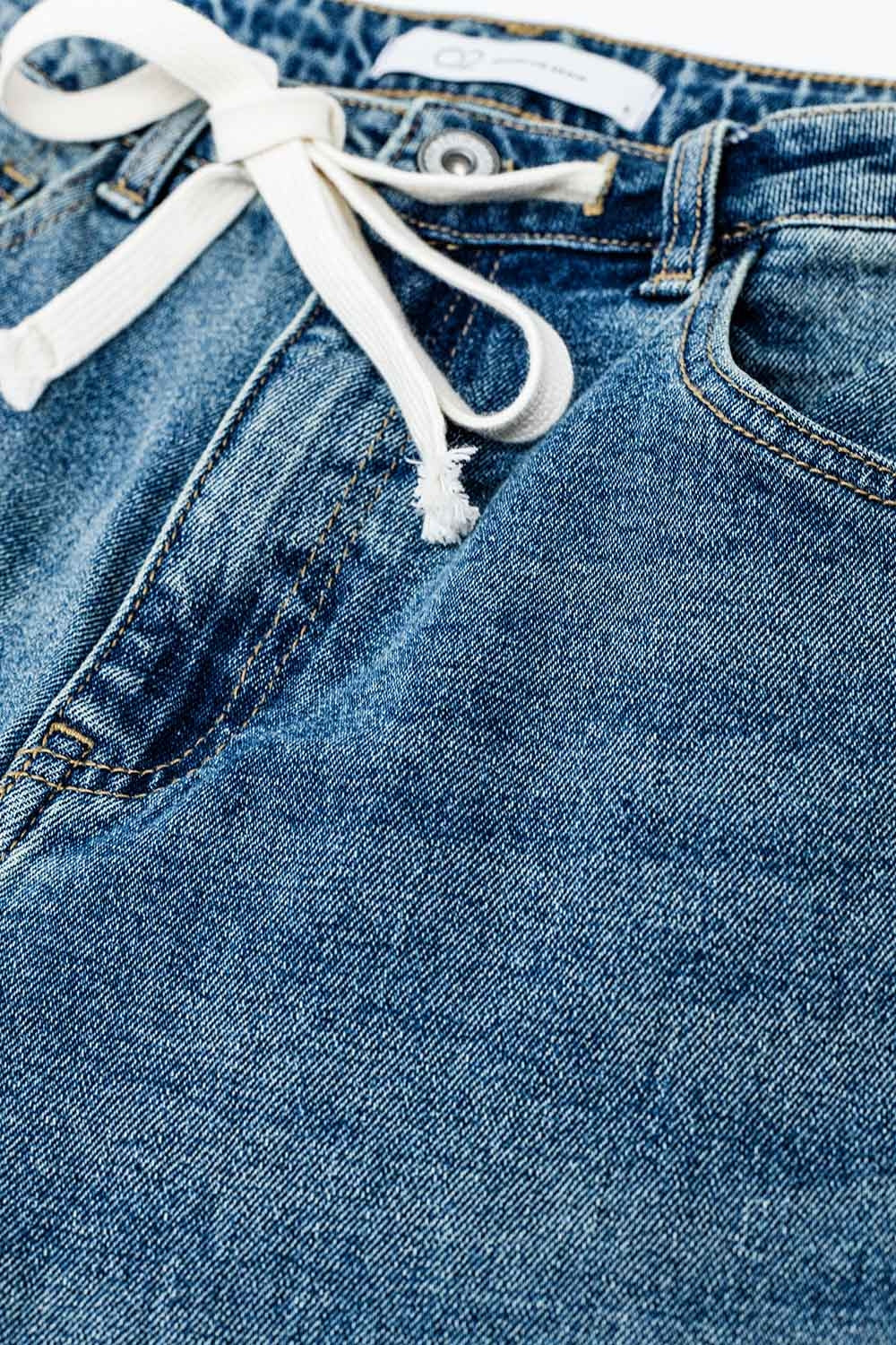 Jean droit bleu avec cordon de serrage
