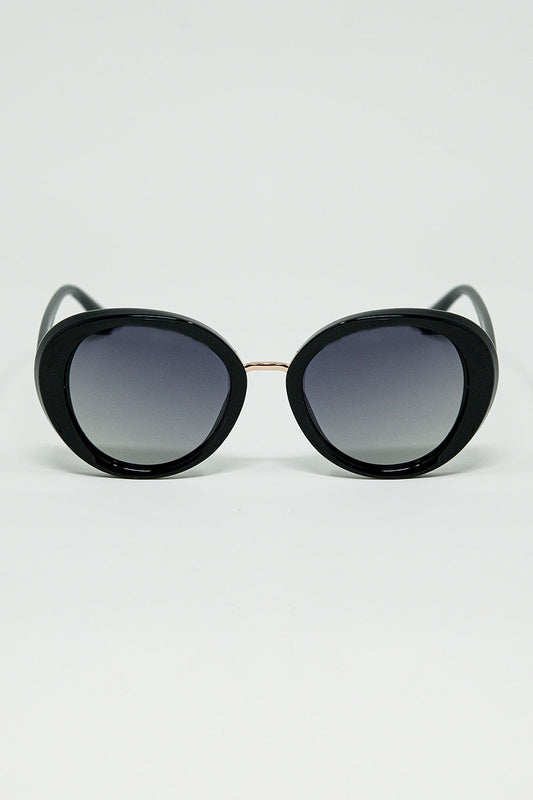 Black Oval Shaped Sunglasses with metal gold detail