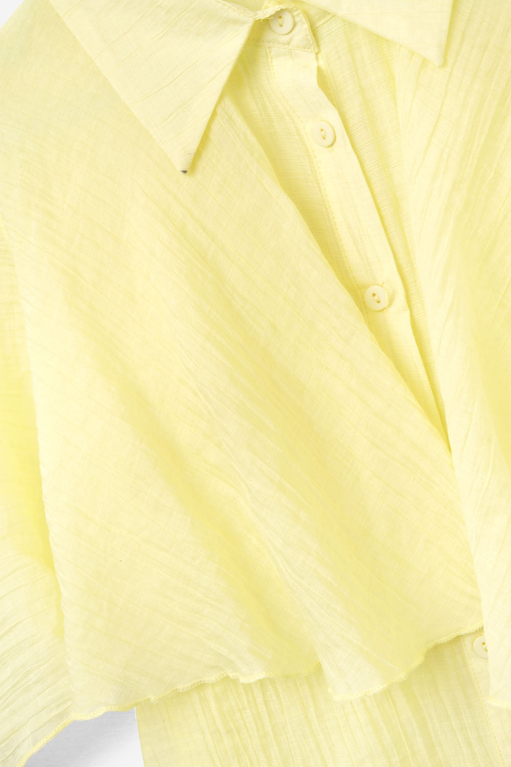 Blouse en mousseline de soie texturée jaune à manches tombantes