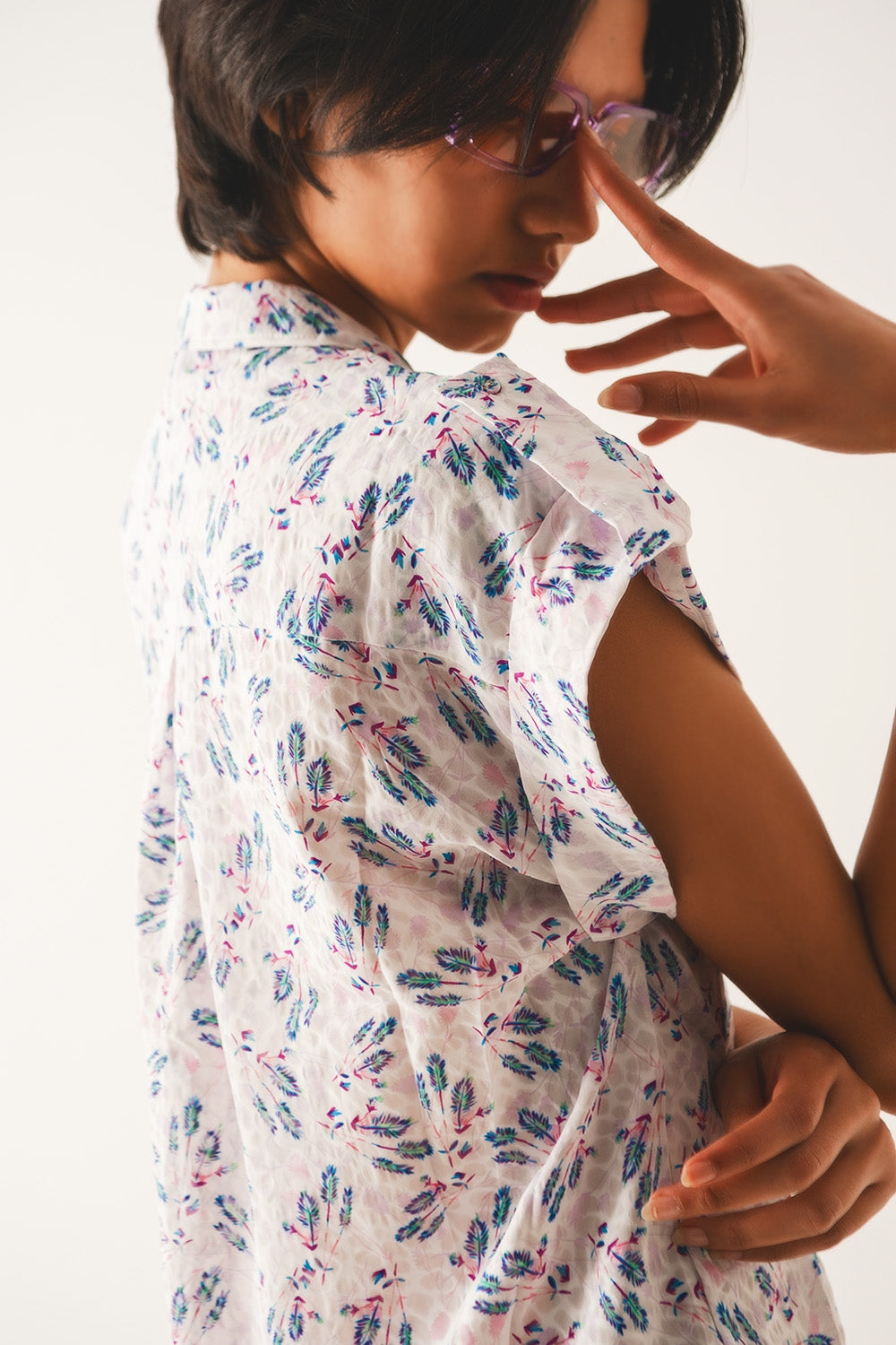 Blouse mauve avec poches et imprimé floral