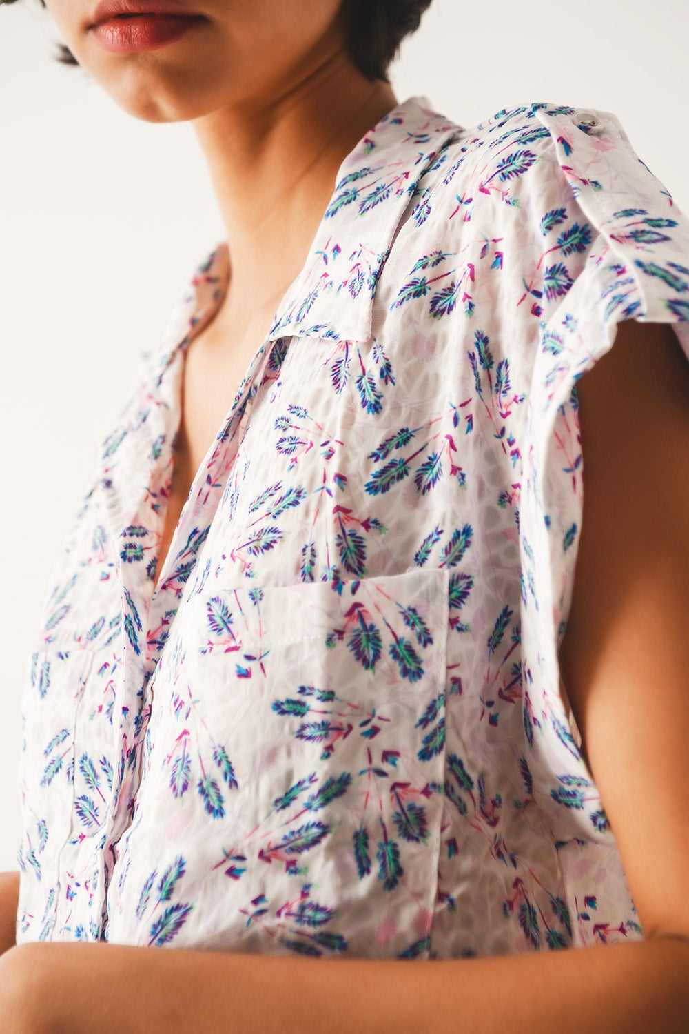 Blouse mauve avec poches et imprimé floral