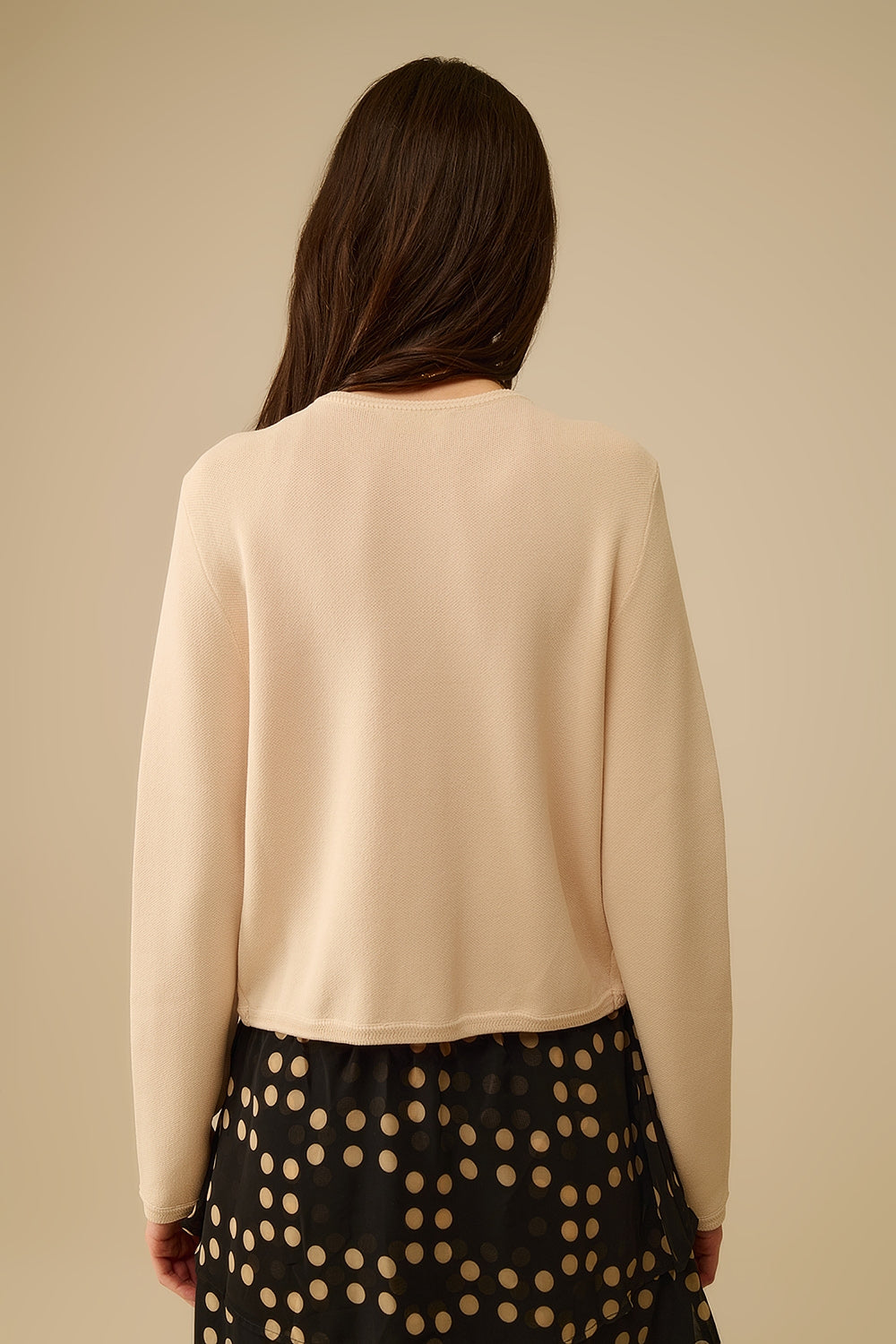 Cardigan beige avec boutons dorés