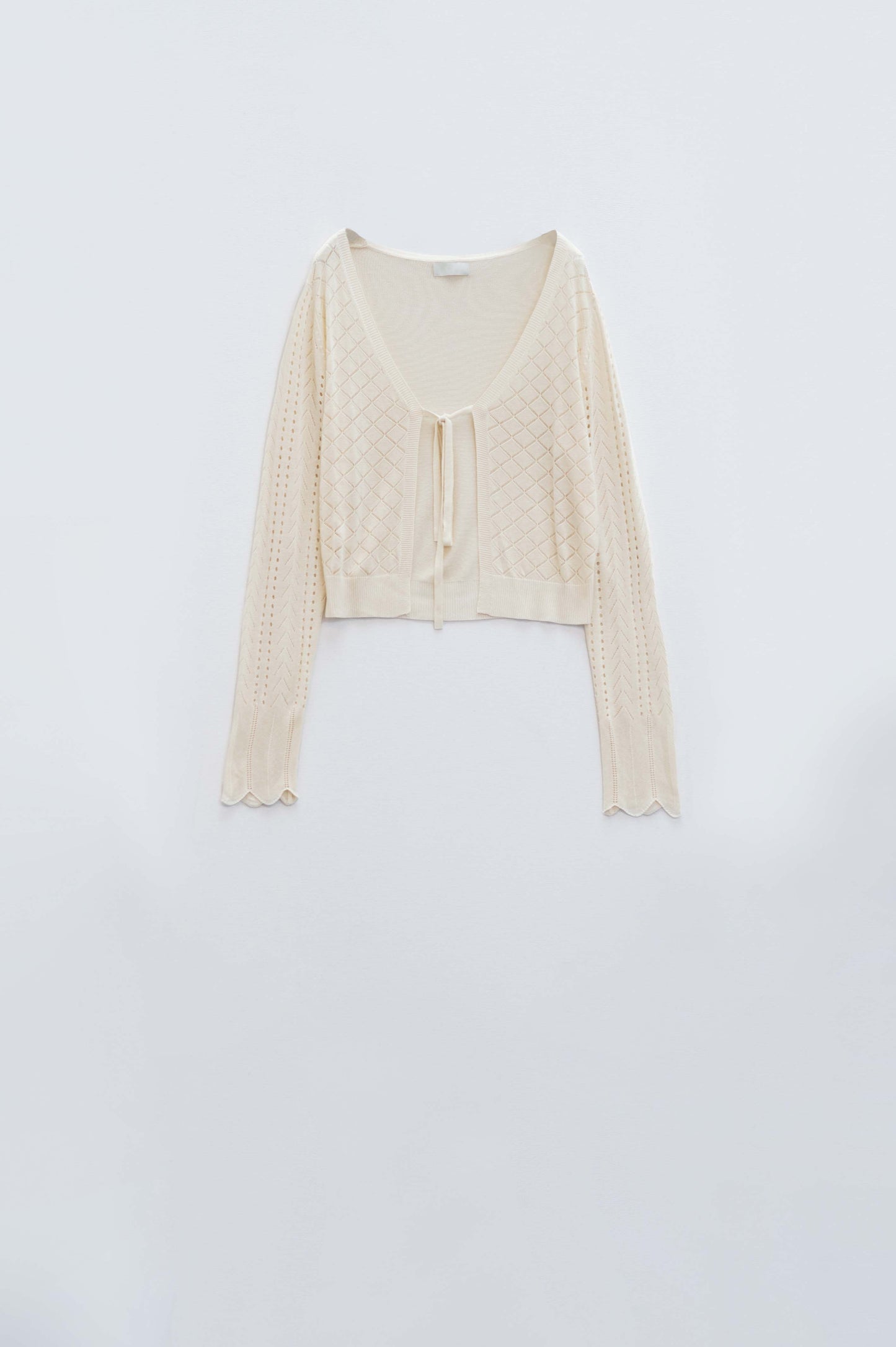 Q2 Cardigan beige avec imprimé Argyle et fermeture à nouer