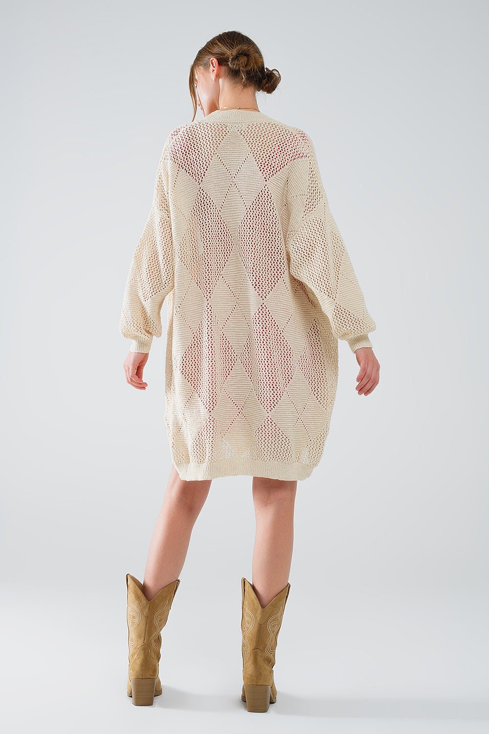 Cardigan drapé beige avec motif en crochet