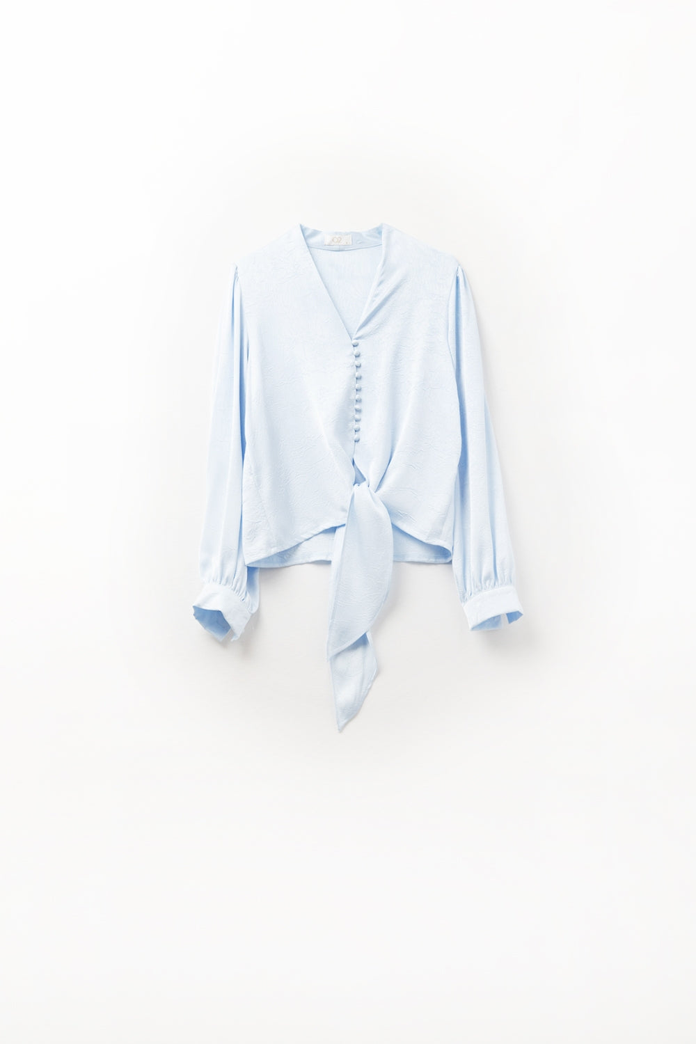 Chemise à boutons raccourcie en bleu avec nœud