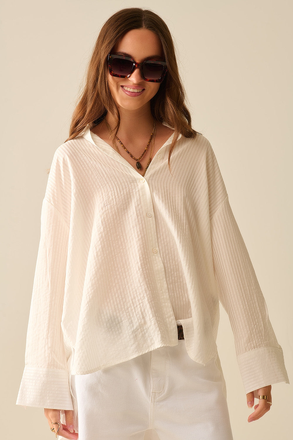 chemise blanche surdimensionnée avec nœud dans le dos