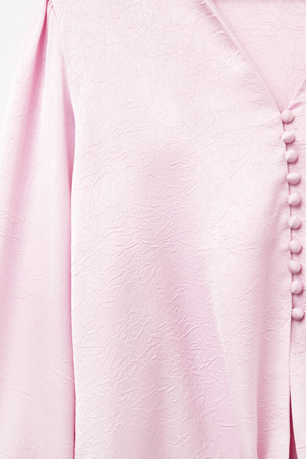 Chemise croisée rose avec nœud