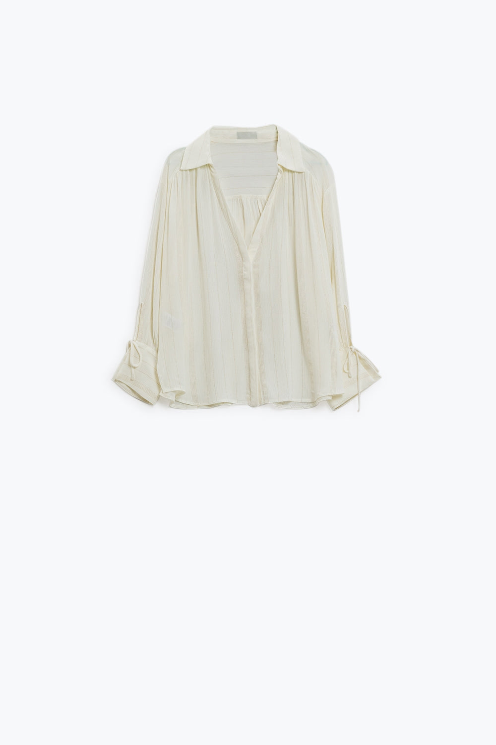 Chemise légère blanche à col en V avec détails à rayures