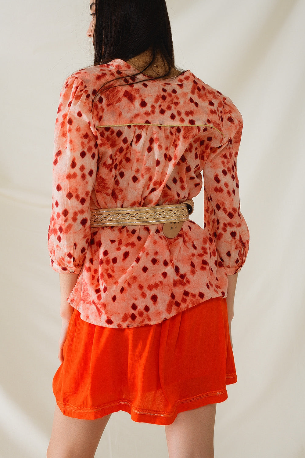Chemise orange à imprimé abstrait et manches 3/4