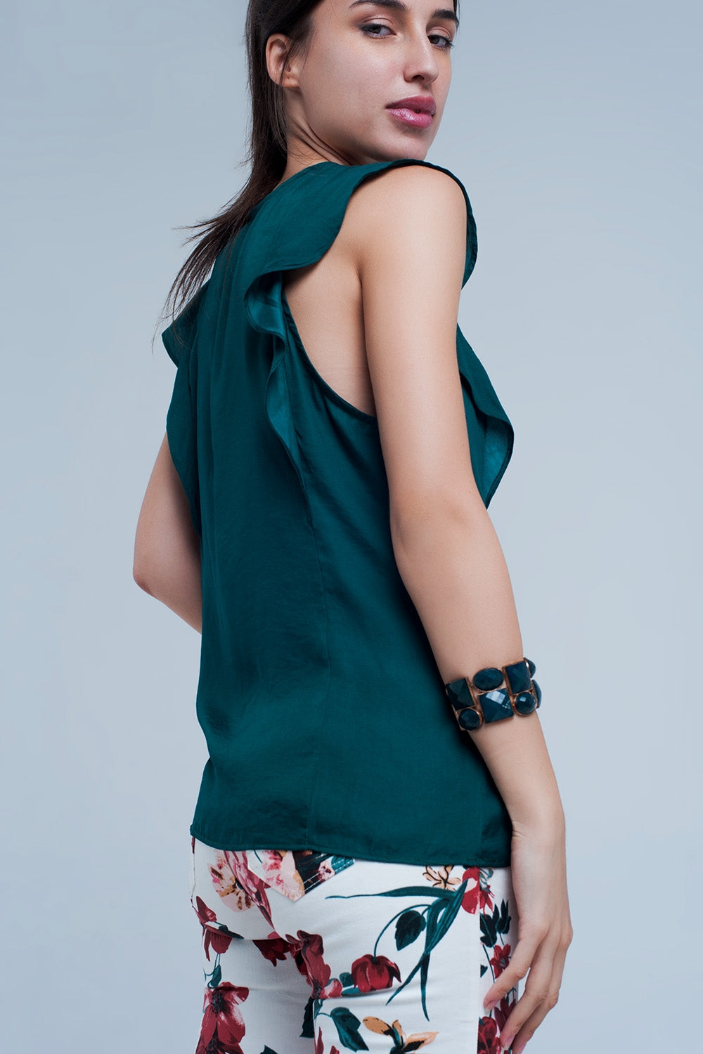 Chemise sans manches à volants et vert foncé
