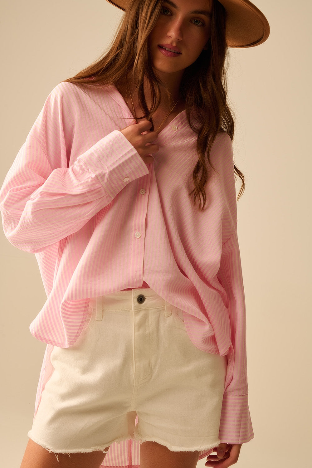 chemise surdimensionnée rose bébé avec nœud dans le dos