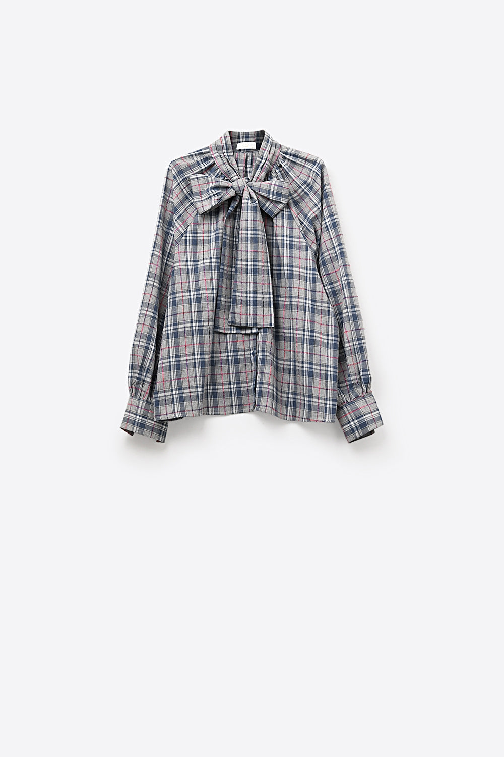Chemisier bleu à carreaux avec nœud à l'encolure