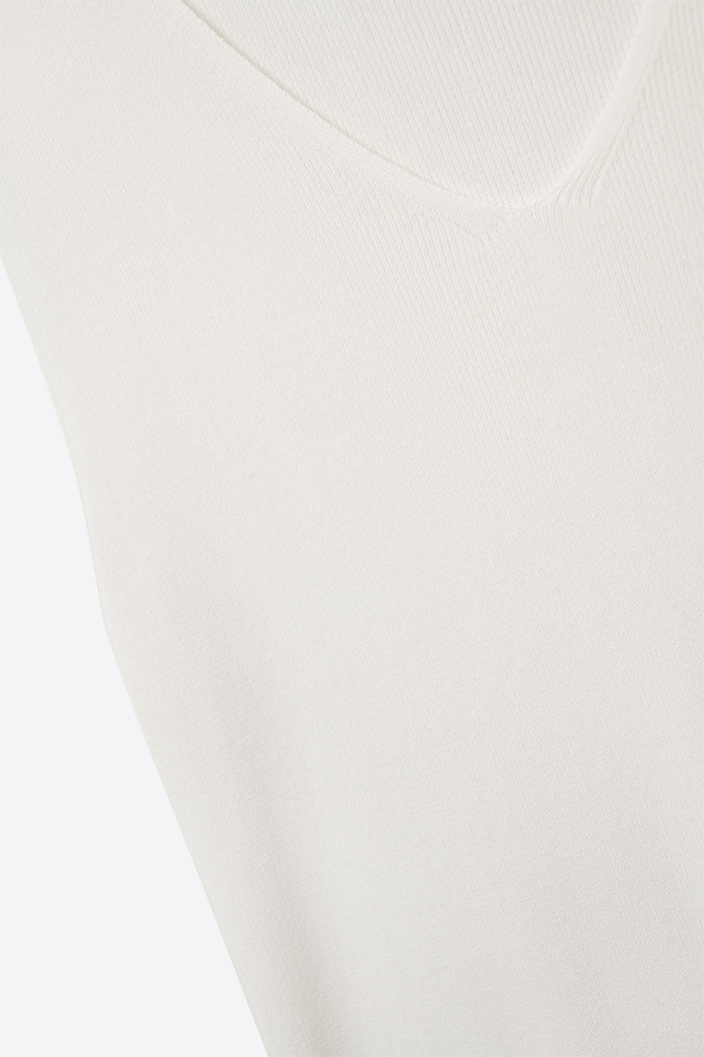 Débardeur blanc sans manches en maille fine avec col en V