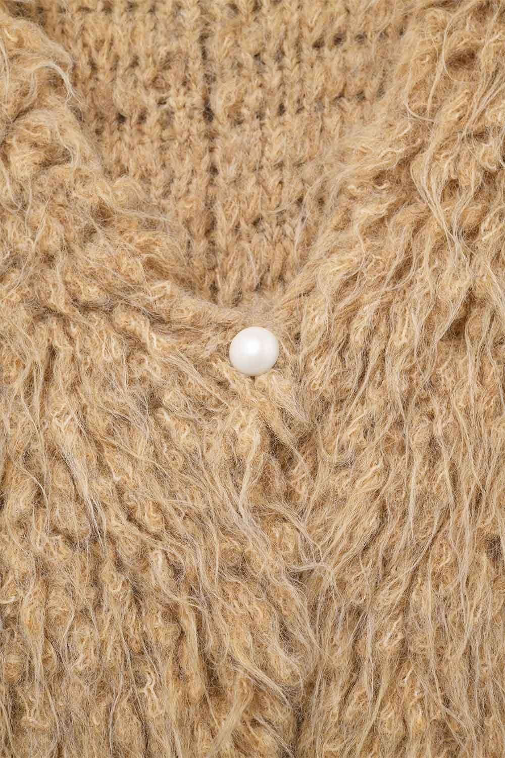 Gilet luxueux avec texture beige à poils longs