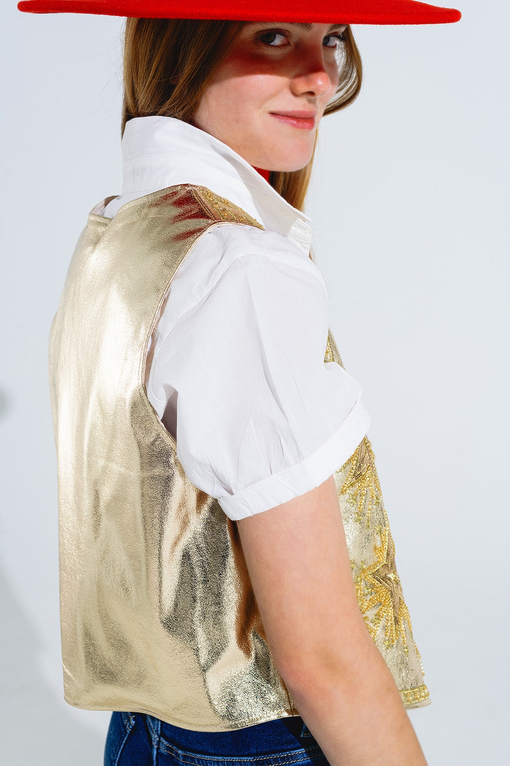 Gilet ouvert avec étoiles brodées en or