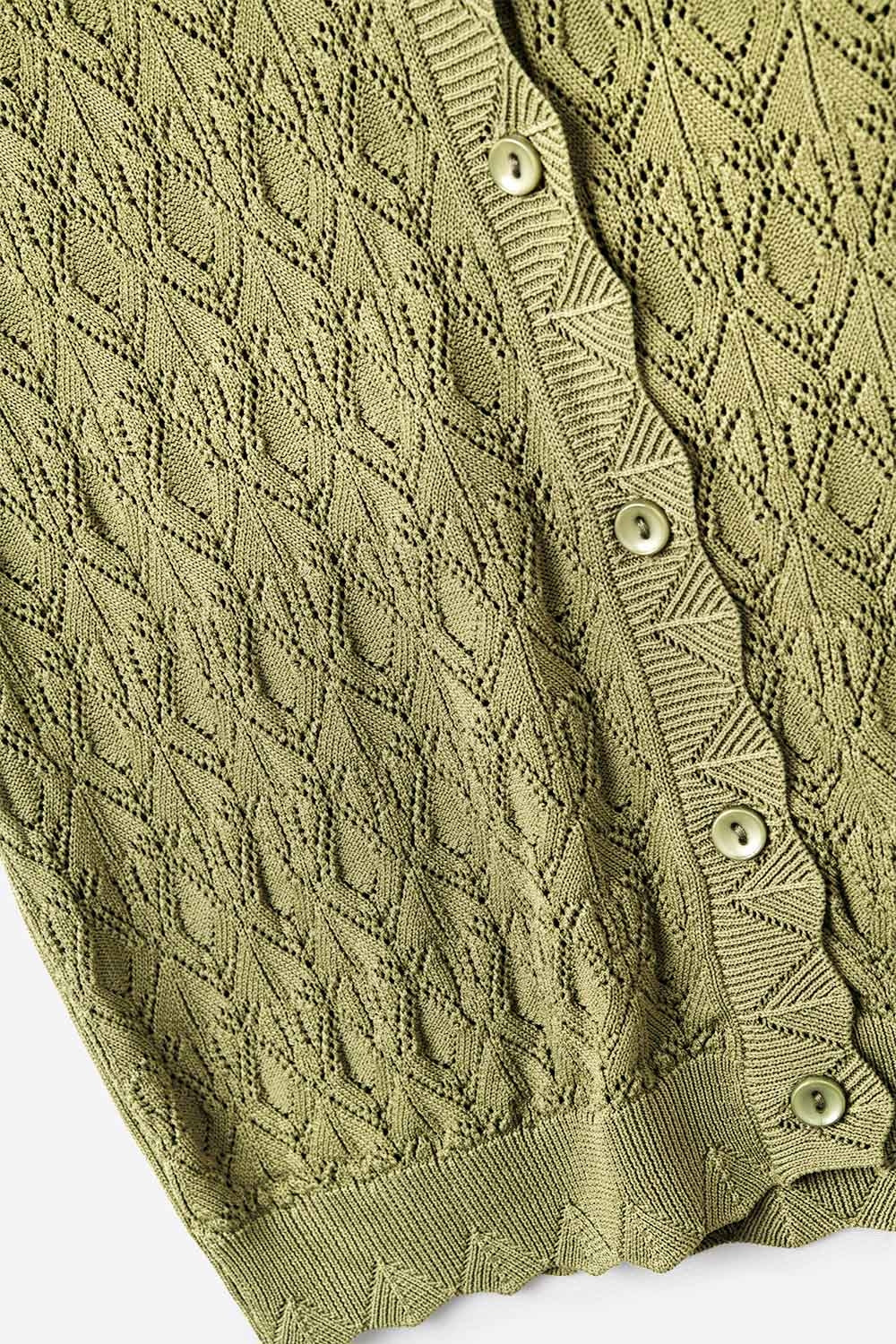 Gilet sans manches boutonné en kaki avec motif abstrait
