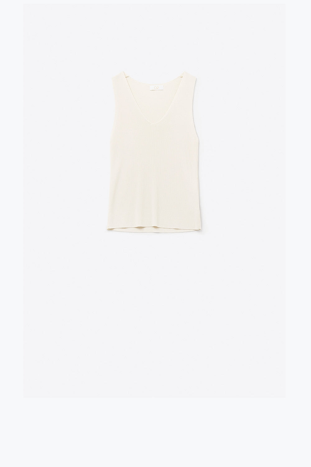 Haut beige sans manches en maille fine avec col en V