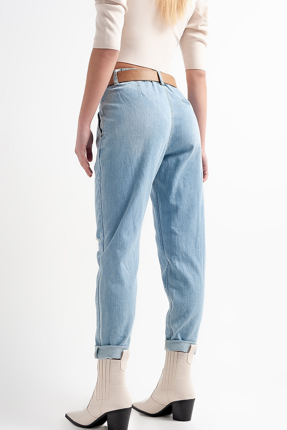 Jean à entrejambe bas en bleu délavé clair vintage avec déchirures