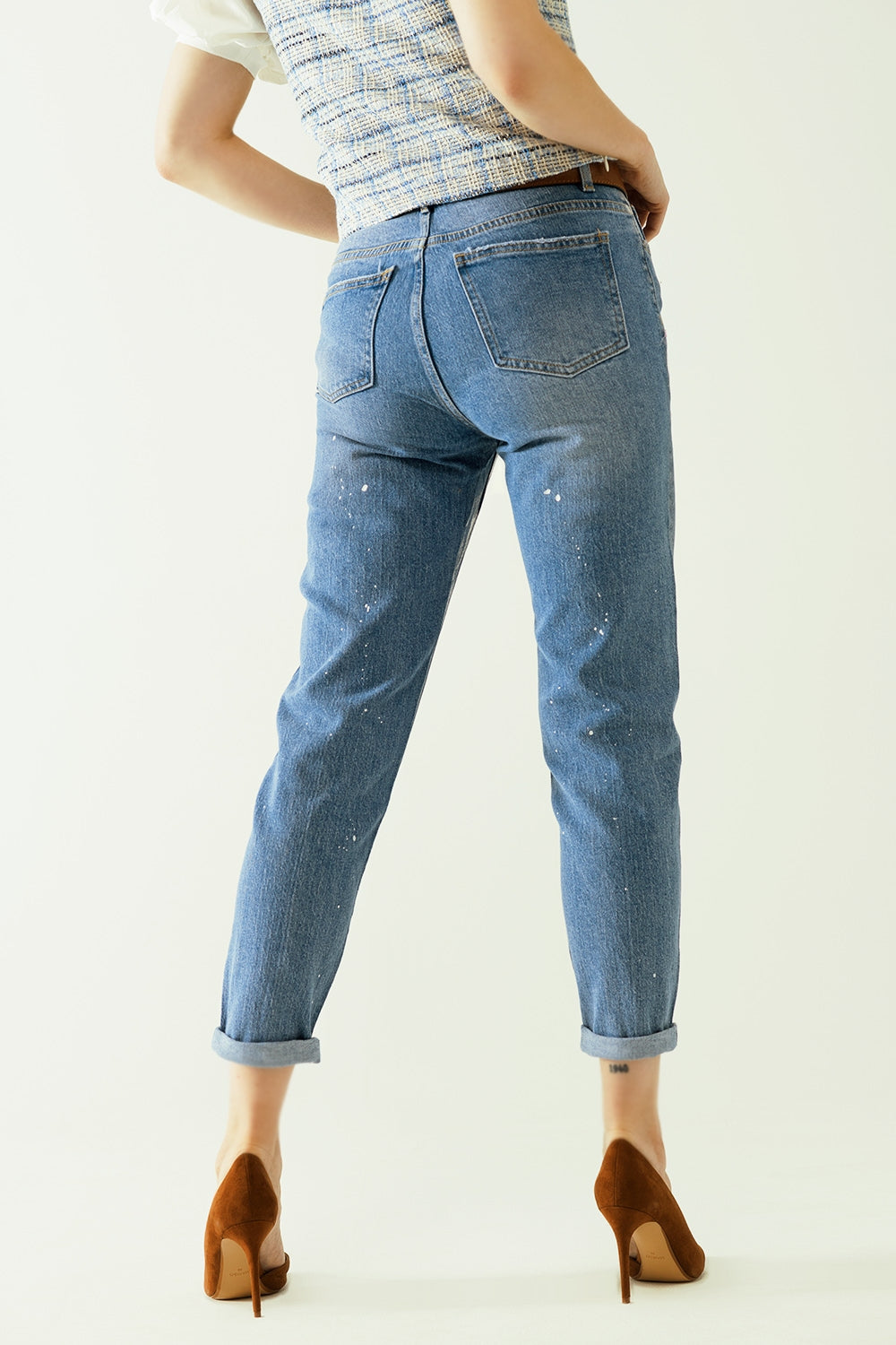 Jean bleu skinny avec finition métallique en délavage léger