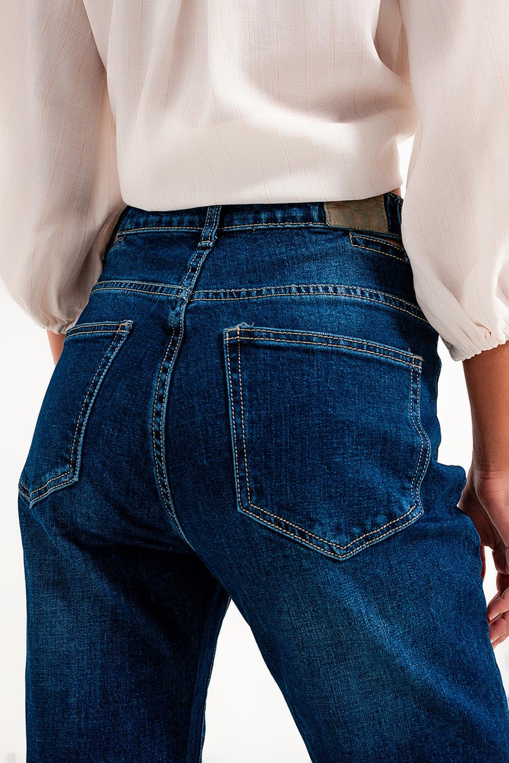 Jean cut out slim à taille haute de couleur bleue